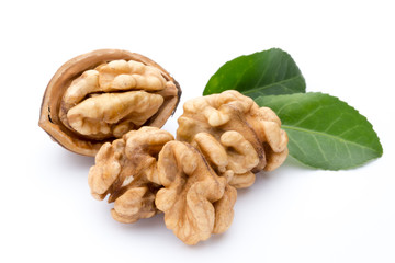 Walnut and walnut kernel isolated on the white background.