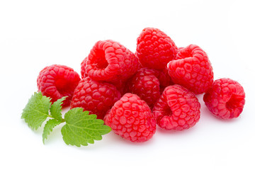 Ripe red raspberries isolated on white background.