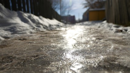 footpath in the city of ice and snow is slippery winter frozen