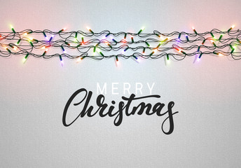 Christmas background with bright realistic garlands. Christmas glowing lights. Xmas Holiday. Greeting cards design