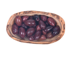 Jumbo pitted kalamata olives in olive wood bowl isolated on white background