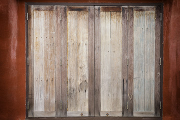 abstract close up old wood window on brown wall - can use to display or montage on product