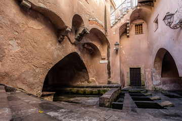 Lavatoio Medievale (Medieval Laundry) in Cefalu, Sicily, Italy. This is the area where women would come to wash and rinse their family’s clothing in the Middle Ages.