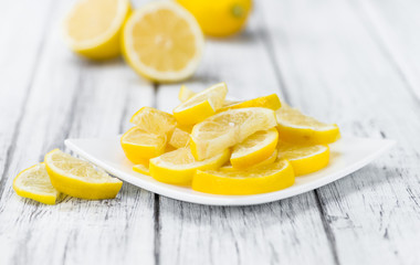 Fresh made Lemon Slices on a rustic background
