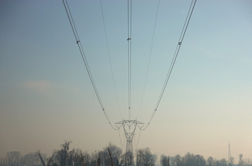 Electricity pylon and wires in the countryside