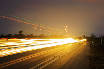 Obraz premium sunset over a highway in the countryside
