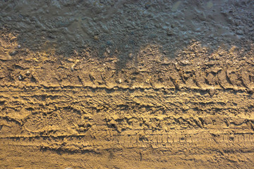 Mud stones and wheel traces