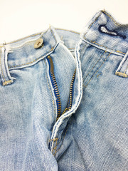 The style and fabric of the jeans style. With buttons and zipper And lack of worn jeans.
