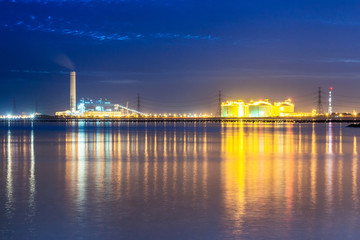 Fototapeta na wymiar Refinery tower in petrochemical industrial plant with Twilight