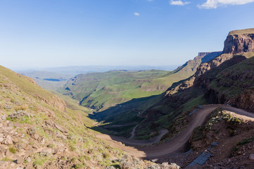 Mountain Pass Valley steep rugged road up and down scenic landscape
