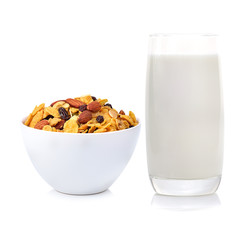 Milk and Healthy breakfast set with almonds raisins walnuts cere