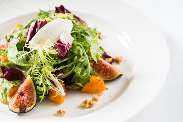 fresh salad with fig and persimmon