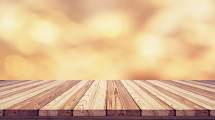 Wood table top on blur bokeh background.