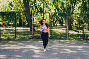 Fototapeta na wymiar sports girl in park