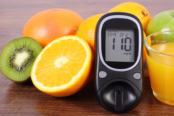 Glucometer, fresh fruits and juice, diabetes, healthy lifestyles and nutrition