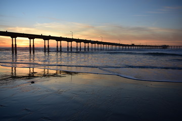Fototapeta premium Zachód słońca na Ocean Beach Pier w Kalifornii