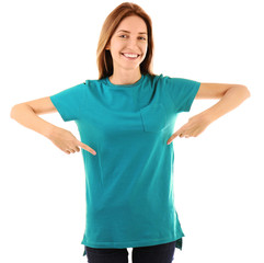 Young woman in blank color t-shirt on white background