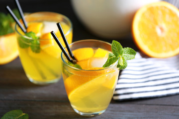 Two glasses of fresh lemonade on table, closeup