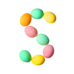 Letter S made of Easter eggs on light background