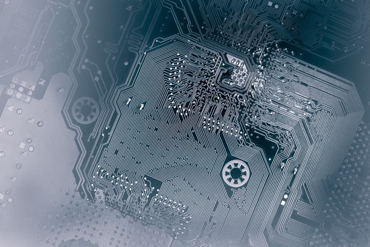 computer motherboard in dark colors as a background for your IT technology presentation