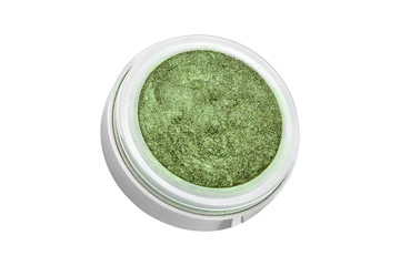 Green color eyeshadow powder with glitter particles, in round grey open container, beauty product isolated on white background