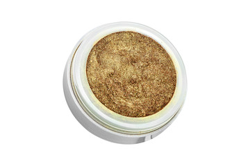 Golden color eyeshadow powder with glitter particles, in round grey open container, beauty product isolated on white background