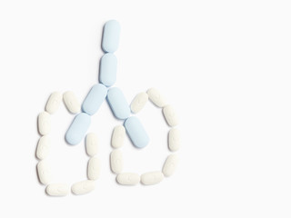 Macro shot of blue and white drugs on white background