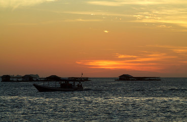 Fototapeta na wymiar the sky after sunset in karimunjawa harbor, Indonesia
