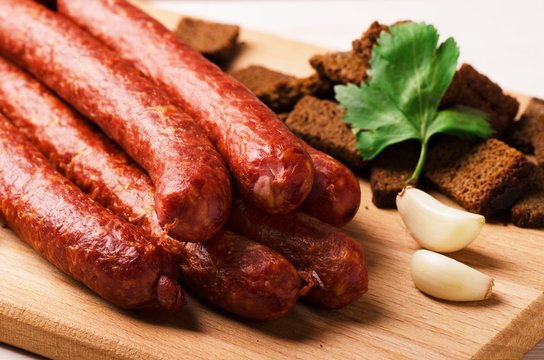 Smoked salami sausage with garlic, croutons and hot peppers
