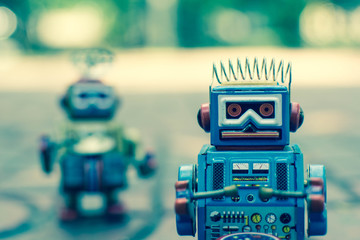 Fototapeta premium Old robot toy, vintage color style, vintage tone background.