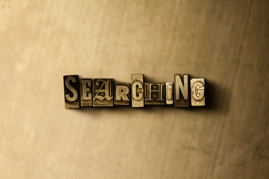 SEARCHING - close-up of grungy vintage typeset word on metal backdrop. Royalty free stock - 3D rendered stock image.  Can be used for online banner ads and direct mail.