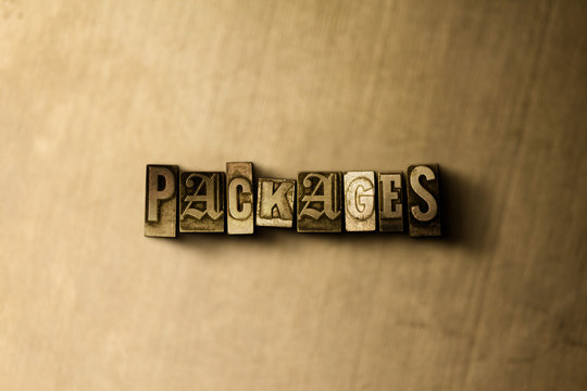 PACKAGES - close-up of grungy vintage typeset word on metal backdrop. Royalty free stock - 3D rendered stock image.  Can be used for online banner ads and direct mail.