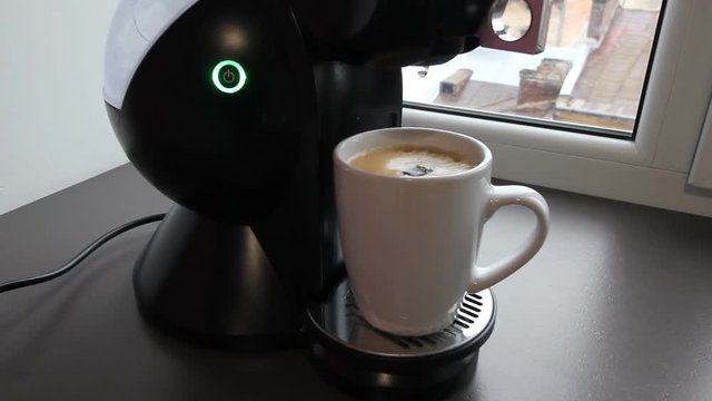 Coffee machine finishes make cup of coffee