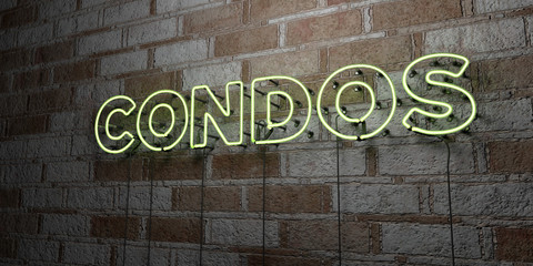 CONDOS - Glowing Neon Sign on stonework wall - 3D rendered royalty free stock illustration.  Can be used for online banner ads and direct mailers..