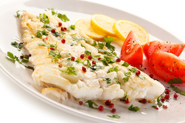 Fish dish - fried fish fillet and vegetables 