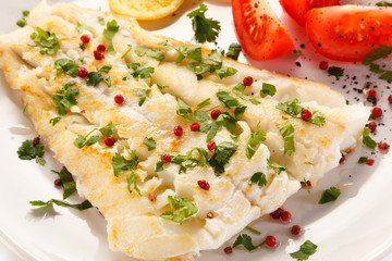 Fish dish - fried fish fillet and vegetables 