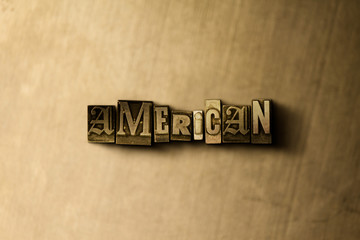 AMERICAN - close-up of grungy vintage typeset word on metal backdrop. Royalty free stock - 3D rendered stock image.  Can be used for online banner ads and direct mail.