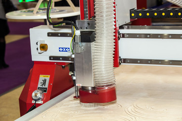 Wood milling machine in action close up process