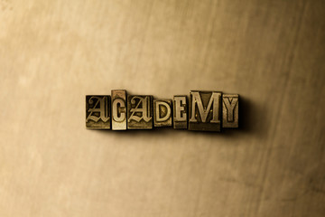 ACADEMY - close-up of grungy vintage typeset word on metal backdrop. Royalty free stock - 3D rendered stock image.  Can be used for online banner ads and direct mail.