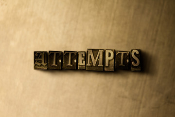 ATTEMPTS - close-up of grungy vintage typeset word on metal backdrop. Royalty free stock - 3D rendered stock image.  Can be used for online banner ads and direct mail.