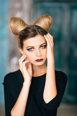 Fototapeta premium Fashion shot of a glamorous blonde woman. Successful lady.