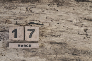 cube calendar for march on wooden background
