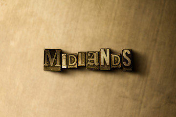 MIDLANDS - close-up of grungy vintage typeset word on metal backdrop. Royalty free stock - 3D rendered stock image.  Can be used for online banner ads and direct mail.