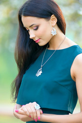 long hair beautiful woman with luxury accessory. Close-up beauty