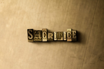 SACRIFICE - close-up of grungy vintage typeset word on metal backdrop. Royalty free stock - 3D rendered stock image.  Can be used for online banner ads and direct mail.