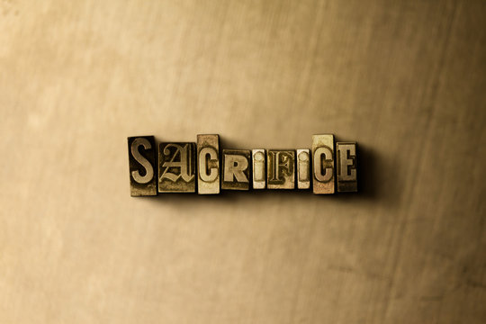 SACRIFICE - close-up of grungy vintage typeset word on metal backdrop. Royalty free stock - 3D rendered stock image.  Can be used for online banner ads and direct mail.