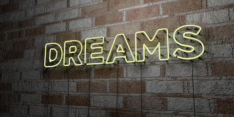 DREAMS - Glowing Neon Sign on stonework wall - 3D rendered royalty free stock illustration.  Can be used for online banner ads and direct mailers..