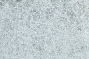 Beautiful ice with abstract cracks. Macro shot.