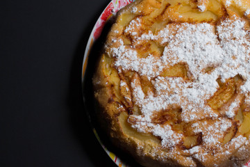 photon picture of cake on the plate you can write in white letters the recipe of your Apple pie or...