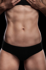 Fototapeta na wymiar Sexy athletic body of woman.